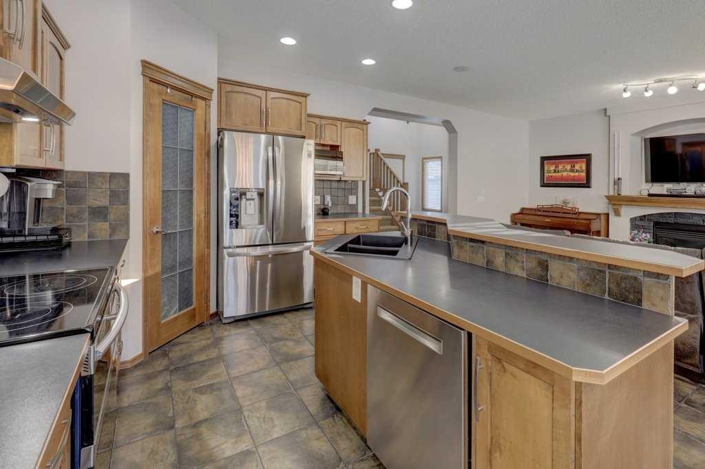 463 Cranfield Gardens Se, Calgary, AB - Indoor Photo Showing Kitchen With Stainless Steel Kitchen With Double Sink