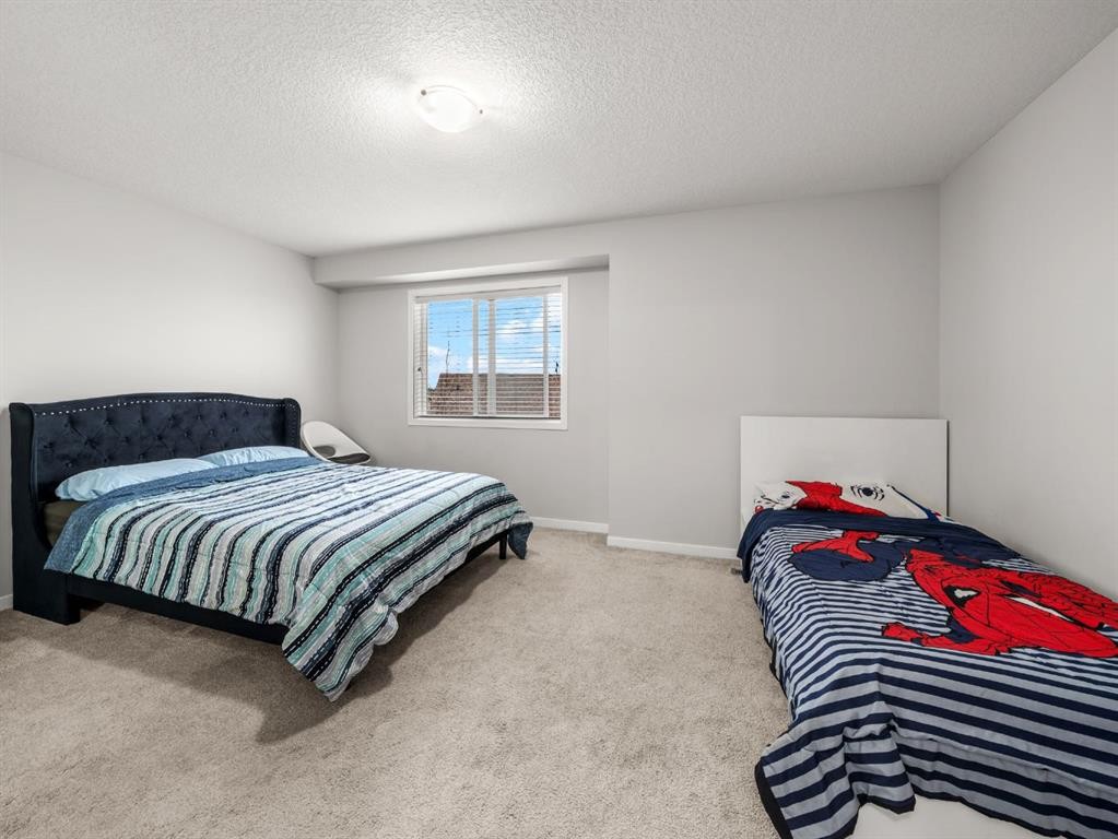 410 Copperstone Manor Se, Calgary, AB - Indoor Photo Showing Bedroom