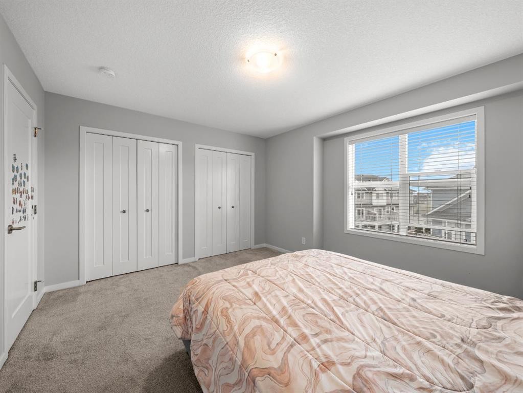 410 Copperstone Manor Se, Calgary, AB - Indoor Photo Showing Bedroom