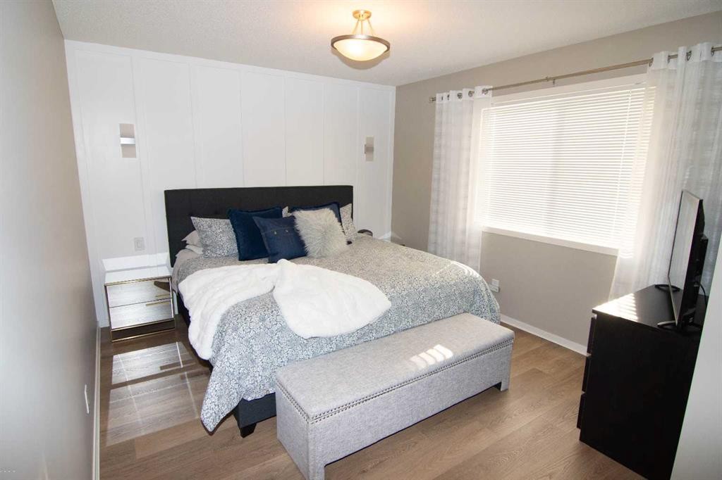 2275 Reunion Street Nw, Airdrie, AB - Indoor Photo Showing Bedroom
