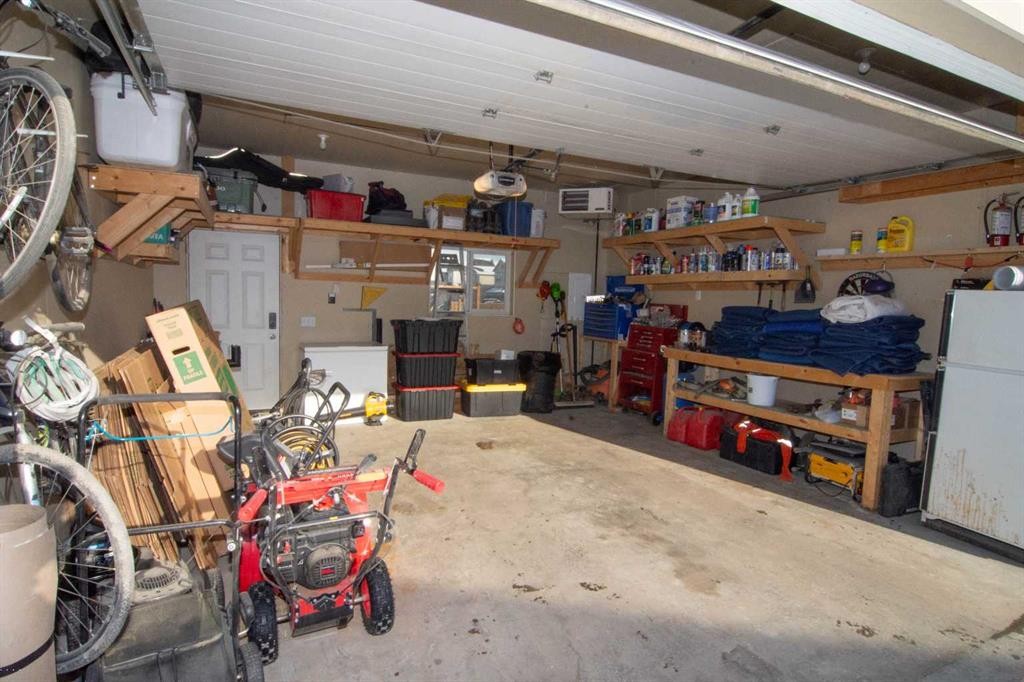 2275 Reunion Street Nw, Airdrie, AB - Indoor Photo Showing Garage