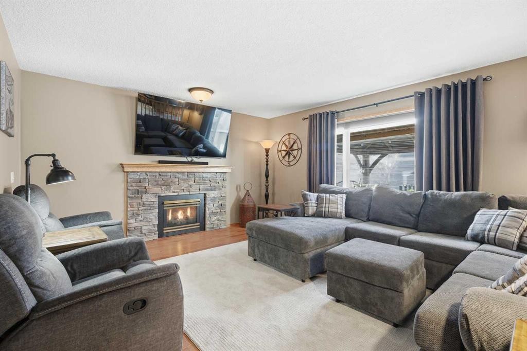 940 Citadel Drive Nw, Calgary, AB - Indoor Photo Showing Living Room With Fireplace