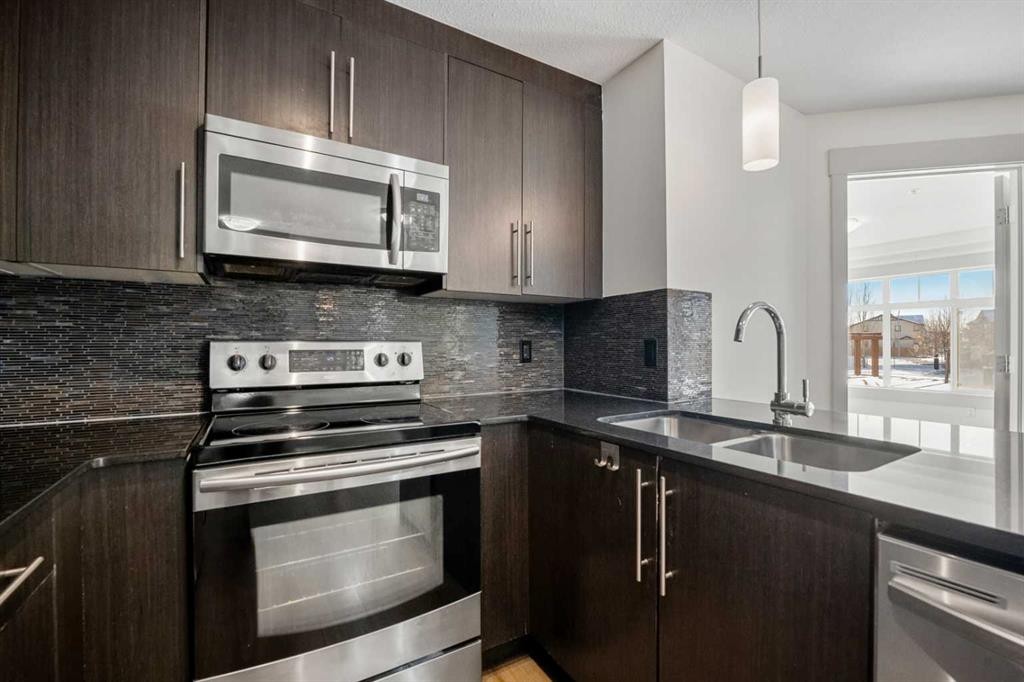 3103-155 Skyview Ranch Way Ne, Calgary, AB - Indoor Photo Showing Kitchen With Double Sink With Upgraded Kitchen