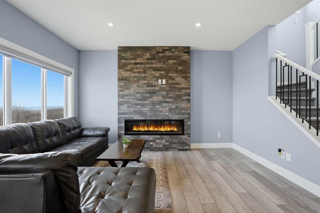 246 Walcrest View Se, Calgary, AB - Indoor Photo Showing Living Room With Fireplace