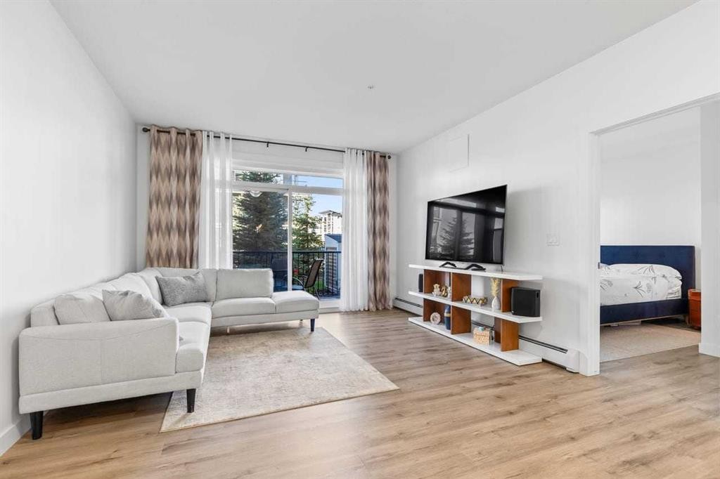 112-40 Walgrove Walk Se, Calgary, AB - Indoor Photo Showing Living Room