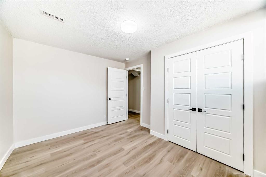 6128 Madigan Drive Ne, Calgary, AB - Indoor Photo Showing Other Room
