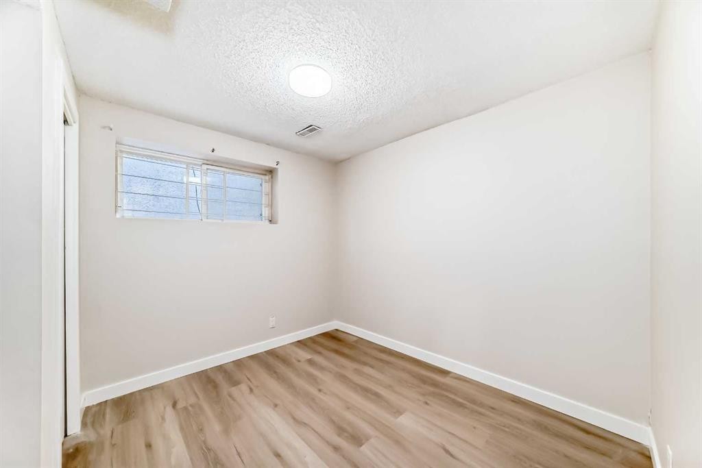 6128 Madigan Drive Ne, Calgary, AB - Indoor Photo Showing Other Room