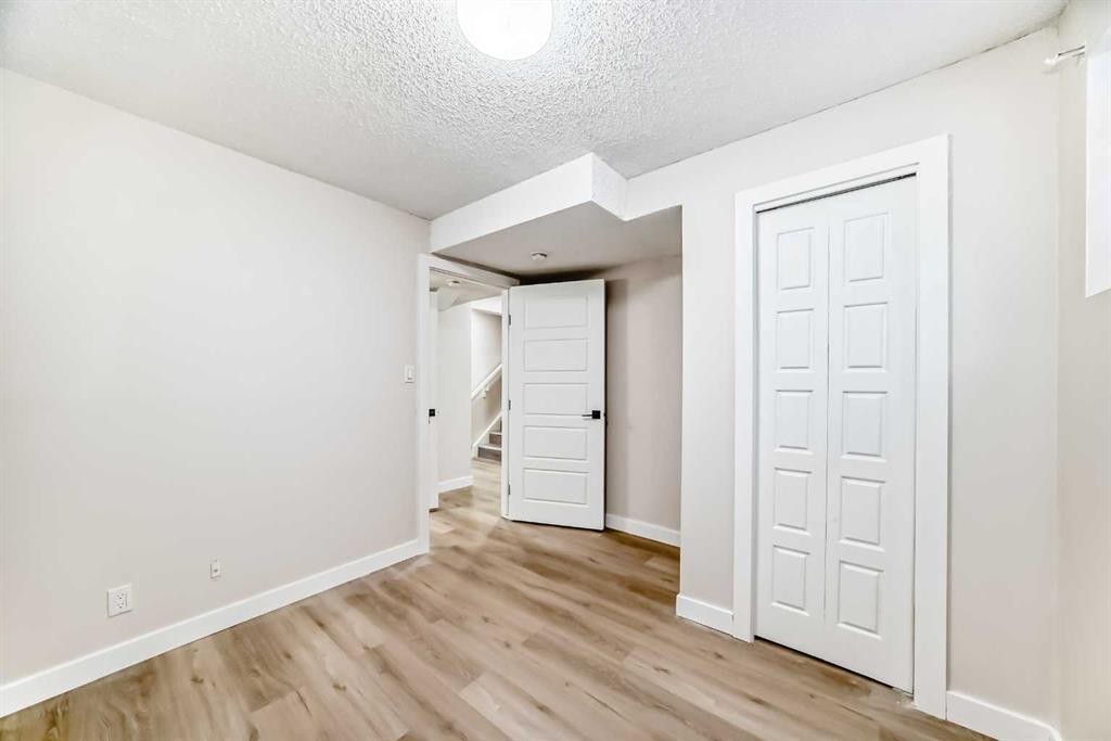 6128 Madigan Drive Ne, Calgary, AB - Indoor Photo Showing Other Room