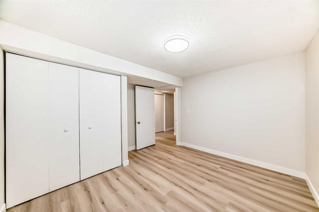 937 Marcombe Drive Ne, Calgary, AB - Indoor Photo Showing Other Room