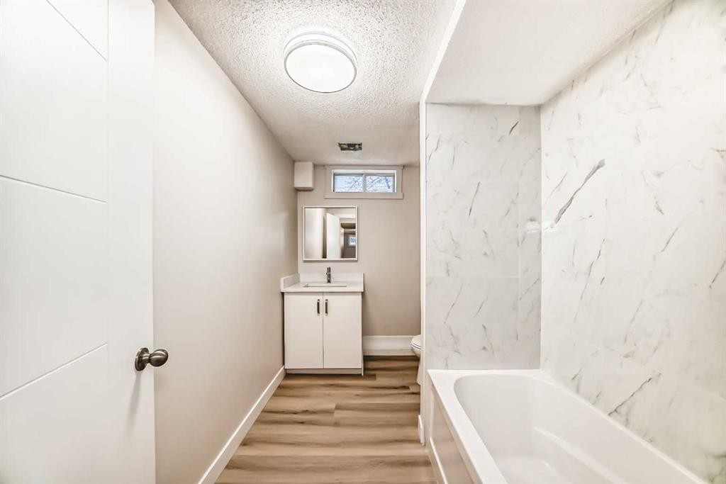 937 Marcombe Drive Ne, Calgary, AB - Indoor Photo Showing Other Room