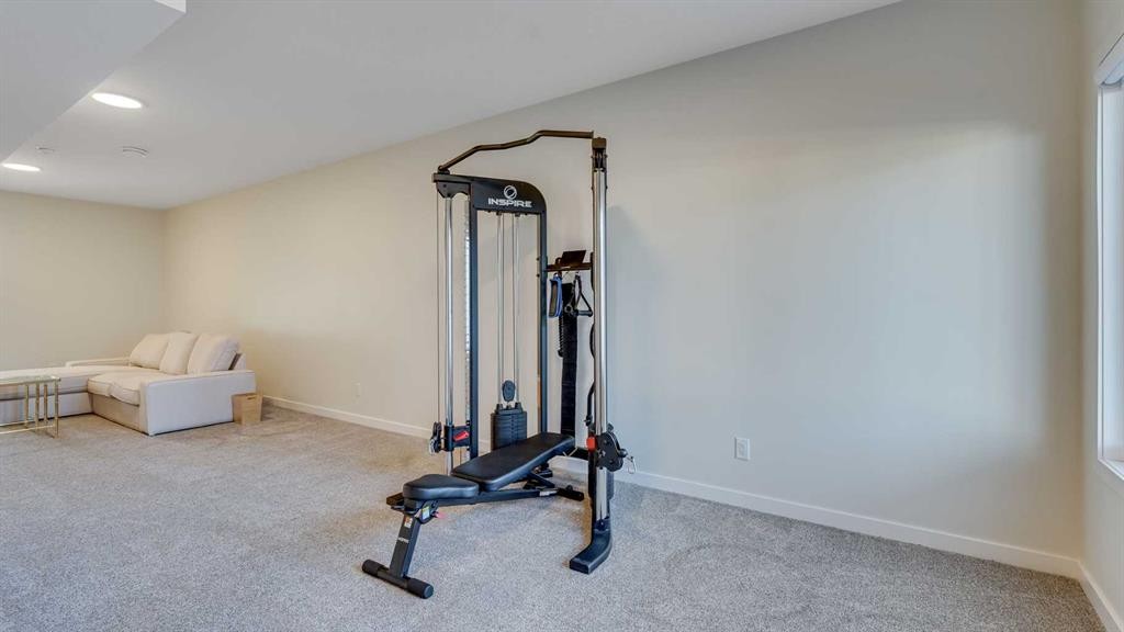18 Amblehurst Path Nw, Calgary, AB - Indoor Photo Showing Gym Room