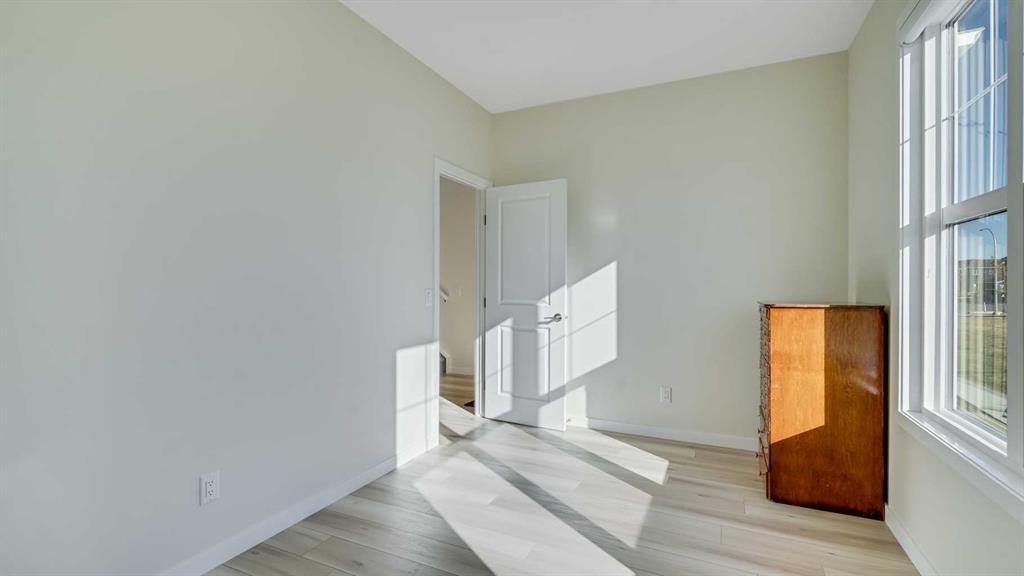 18 Amblehurst Path Nw, Calgary, AB - Indoor Photo Showing Other Room
