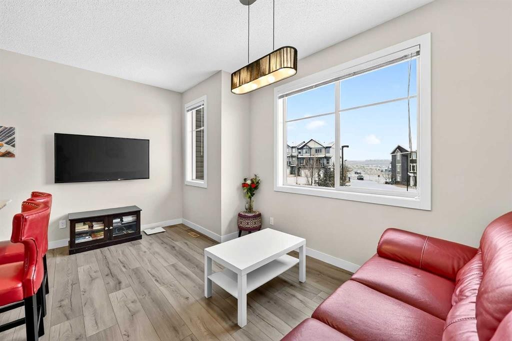 403 Sage Hill Grove Nw, Calgary, AB - Indoor Photo Showing Living Room With Fireplace