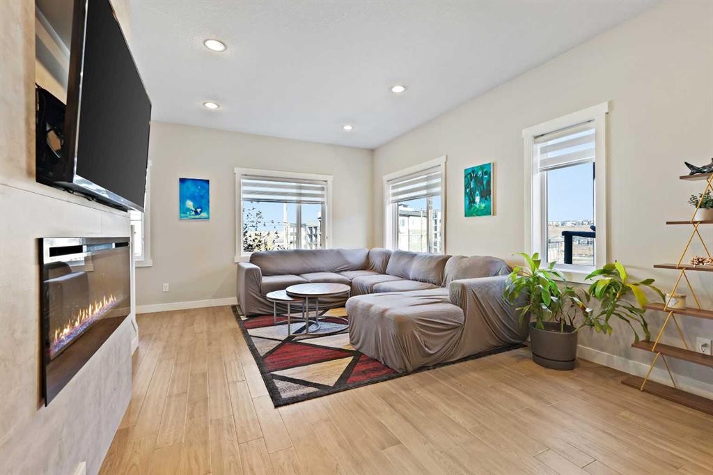 357 Sage Hill Circle Nw, Calgary, AB - Indoor Photo Showing Living Room With Fireplace