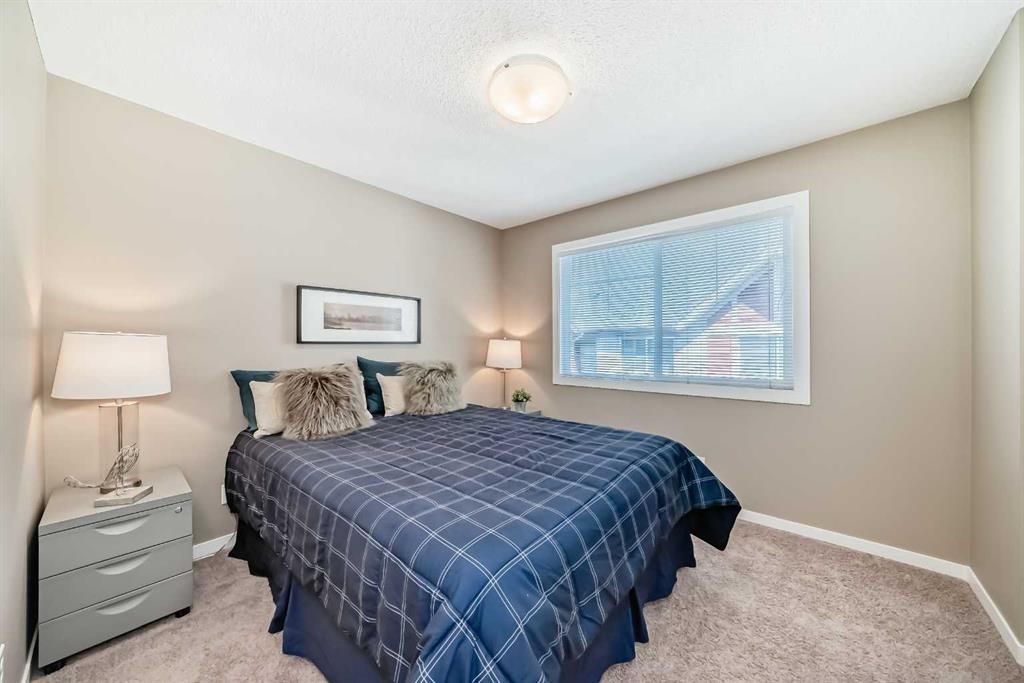236 New Brighton Row Se, Calgary, AB - Indoor Photo Showing Bedroom