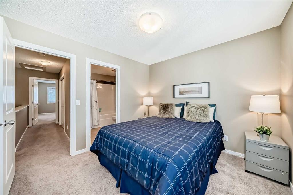 236 New Brighton Row Se, Calgary, AB - Indoor Photo Showing Bedroom