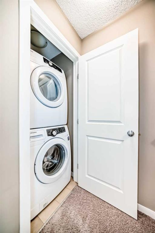 236 New Brighton Row Se, Calgary, AB - Indoor Photo Showing Laundry Room