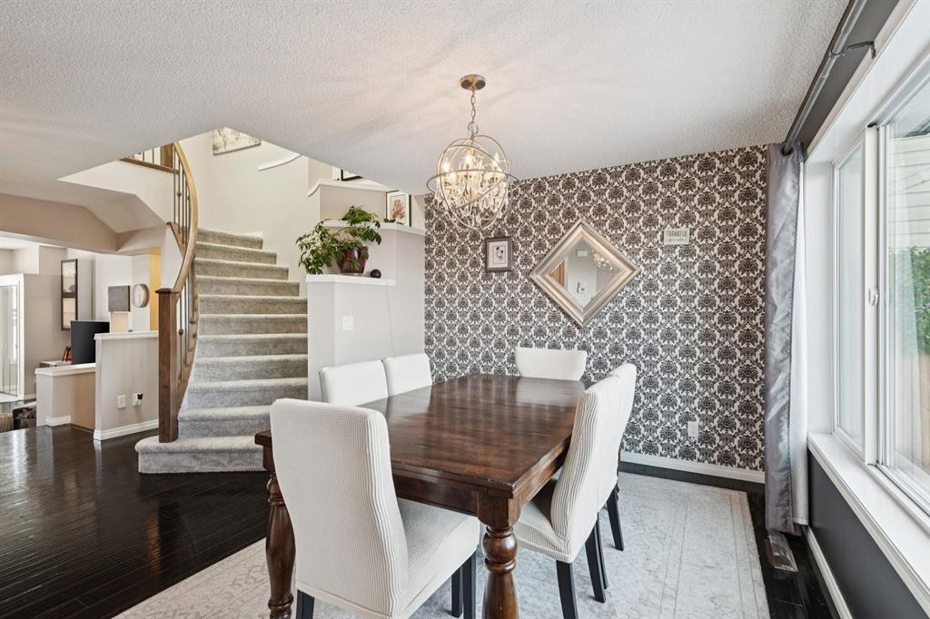 15 New Brighton Common Se, Calgary, AB - Indoor Photo Showing Dining Room