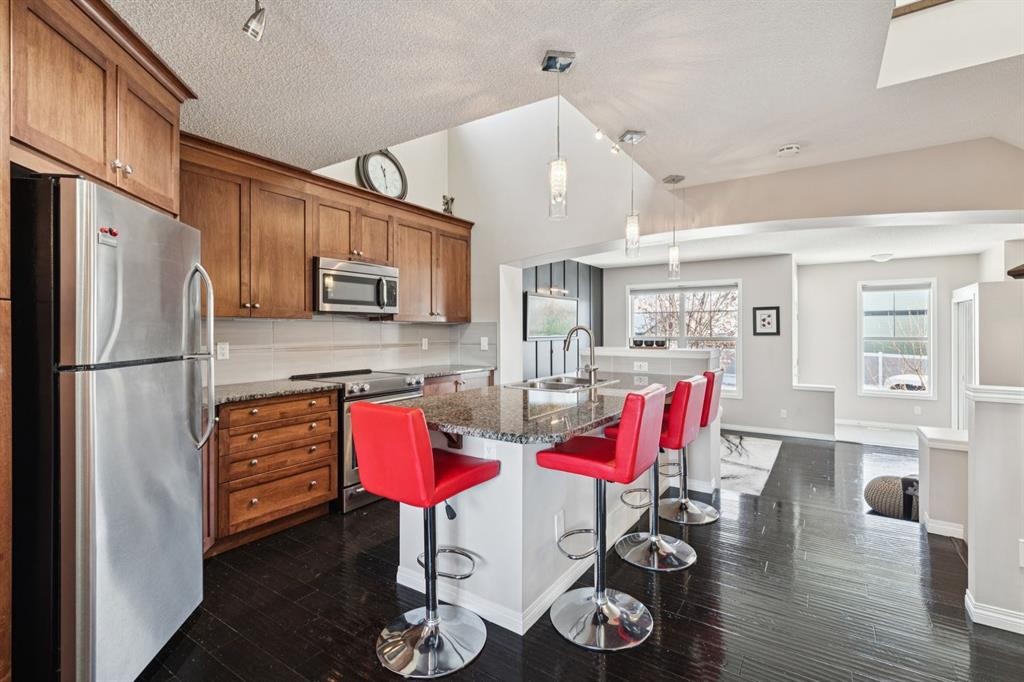 15 New Brighton Common Se, Calgary, AB - Indoor Photo Showing Kitchen With Double Sink With Upgraded Kitchen