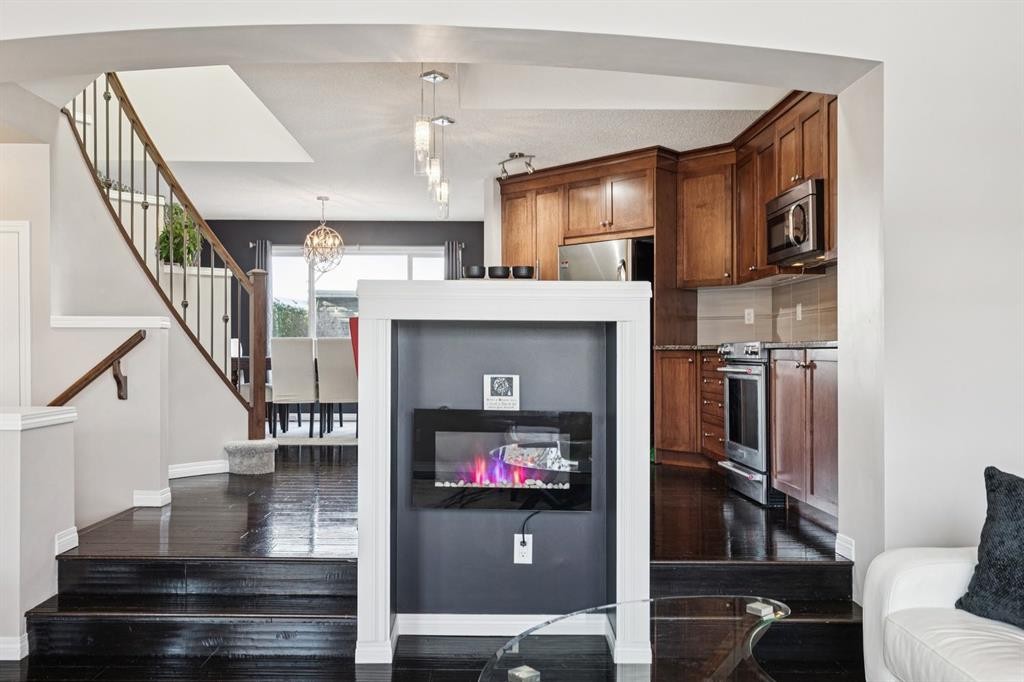 15 New Brighton Common Se, Calgary, AB - Indoor With Fireplace
