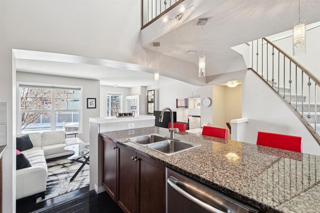 15 New Brighton Common Se, Calgary, AB - Indoor Photo Showing Kitchen With Double Sink