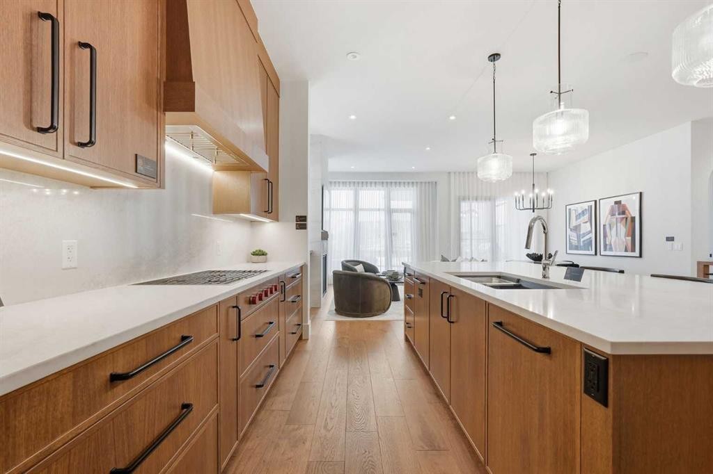 733 Serenity Bend, Heritage Pointe, AB - Indoor Photo Showing Kitchen With Double Sink With Upgraded Kitchen