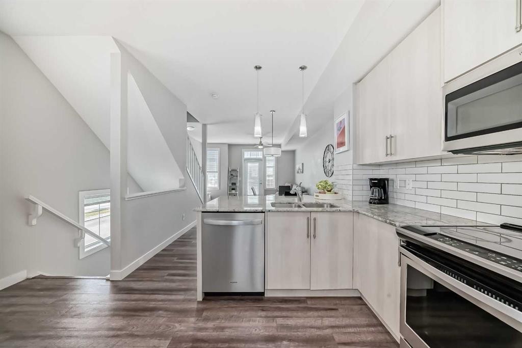 63 Legacy Path Se, Calgary, AB - Indoor Photo Showing Kitchen With Stainless Steel Kitchen With Upgraded Kitchen