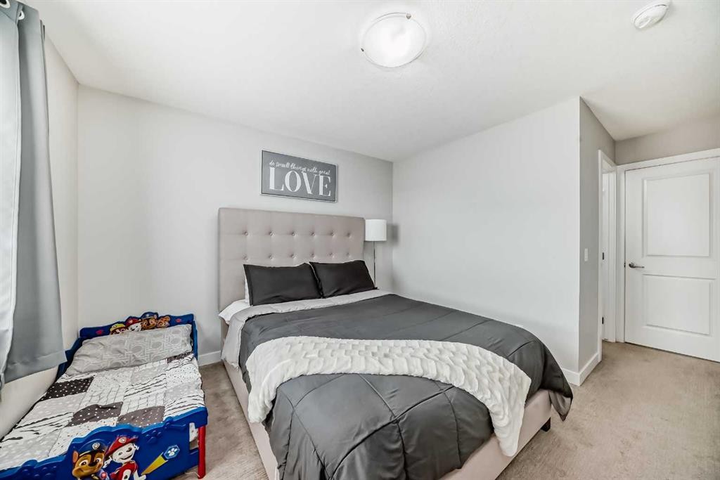 63 Legacy Path Se, Calgary, AB - Indoor Photo Showing Bedroom
