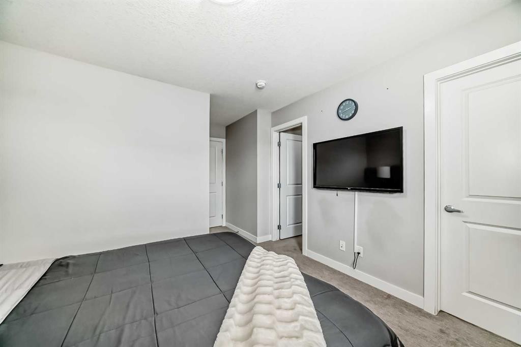 63 Legacy Path Se, Calgary, AB - Indoor Photo Showing Bedroom