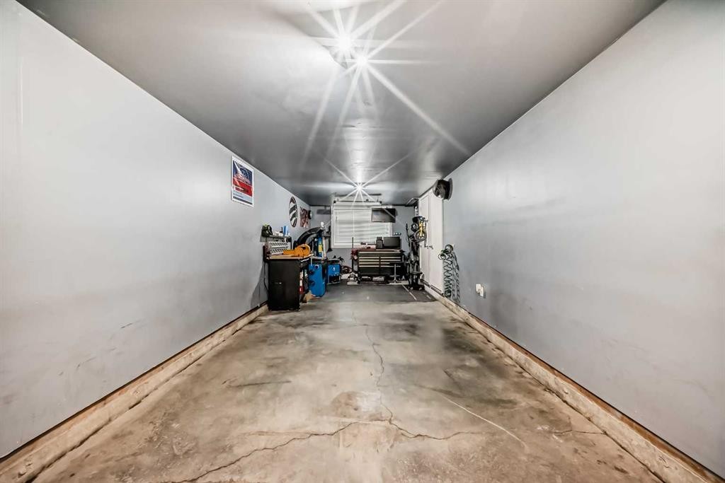 63 Legacy Path Se, Calgary, AB - Indoor Photo Showing Garage