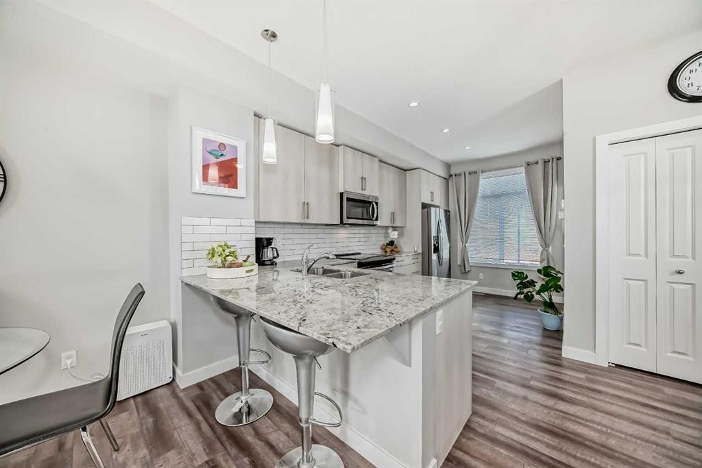 63 Legacy Path Se, Calgary, AB - Indoor Photo Showing Kitchen With Upgraded Kitchen