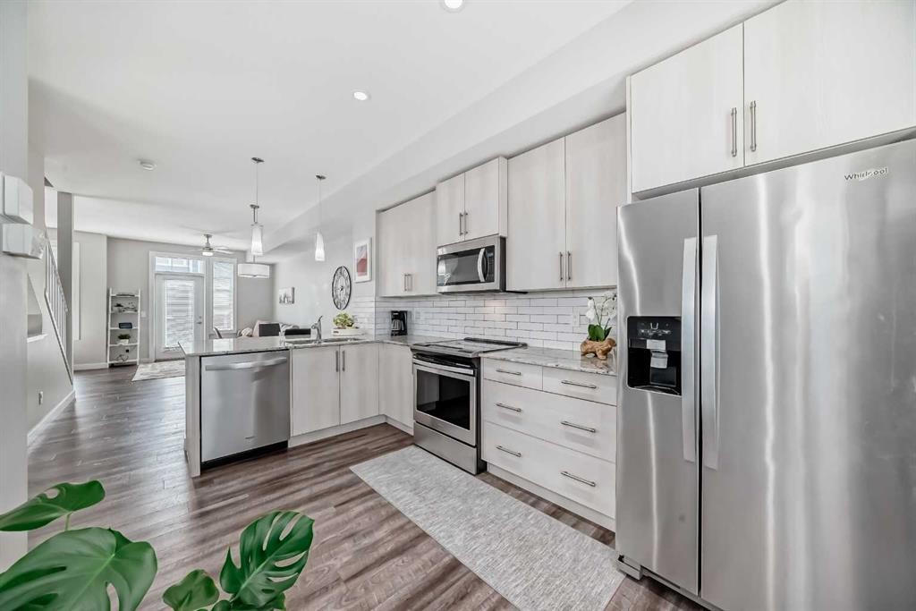 63 Legacy Path Se, Calgary, AB - Indoor Photo Showing Kitchen With Stainless Steel Kitchen With Upgraded Kitchen