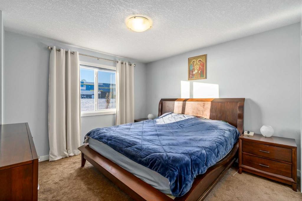 254 Silverado Plains Circle Sw, Calgary, AB - Indoor Photo Showing Bedroom