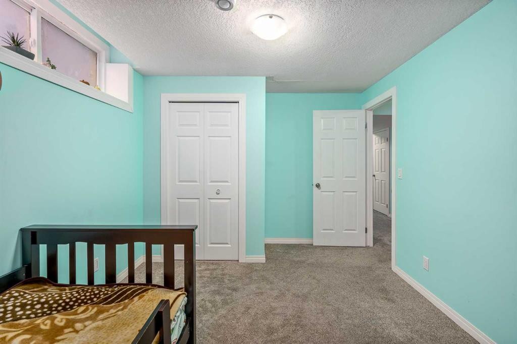 254 Silverado Plains Circle Sw, Calgary, AB - Indoor Photo Showing Bedroom