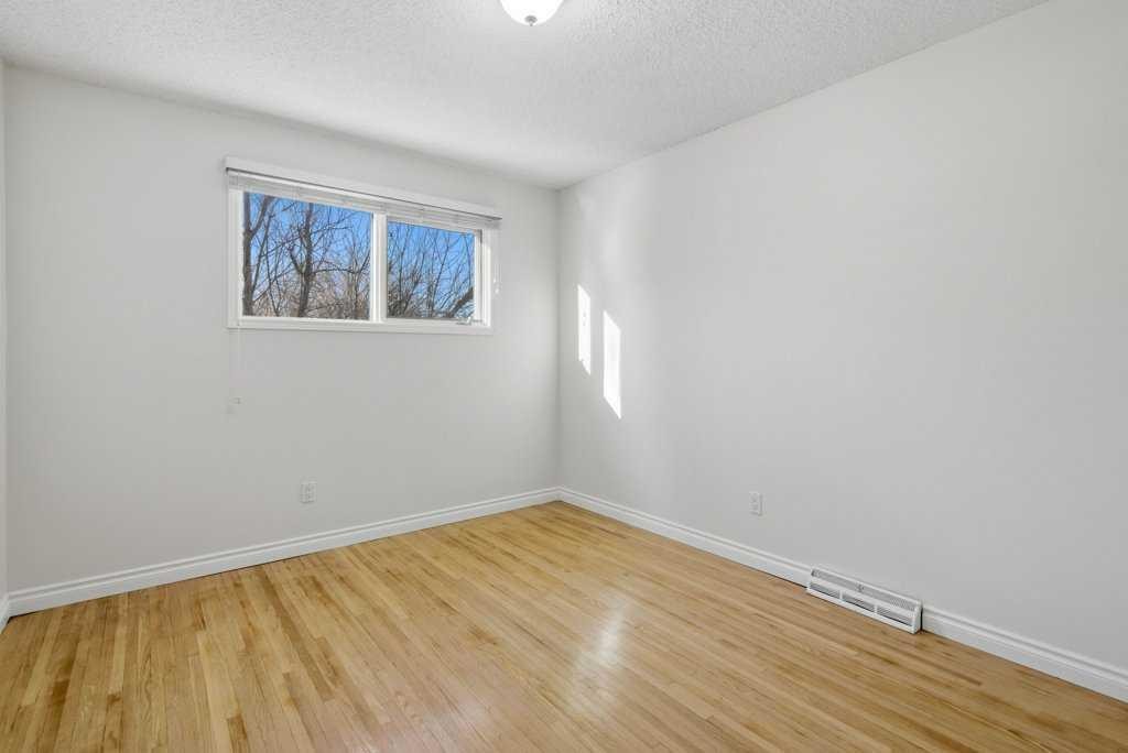 3703 Valdes Place Nw, Calgary, AB - Indoor Photo Showing Other Room
