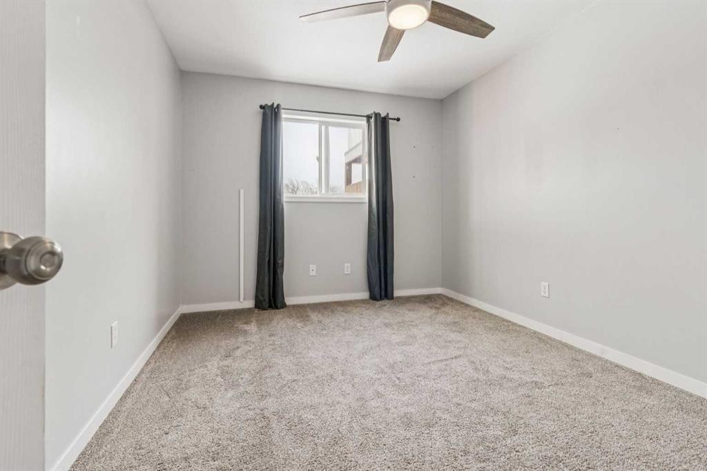 1005 Eagleview Place Nw, High River, AB - Indoor Photo Showing Other Room