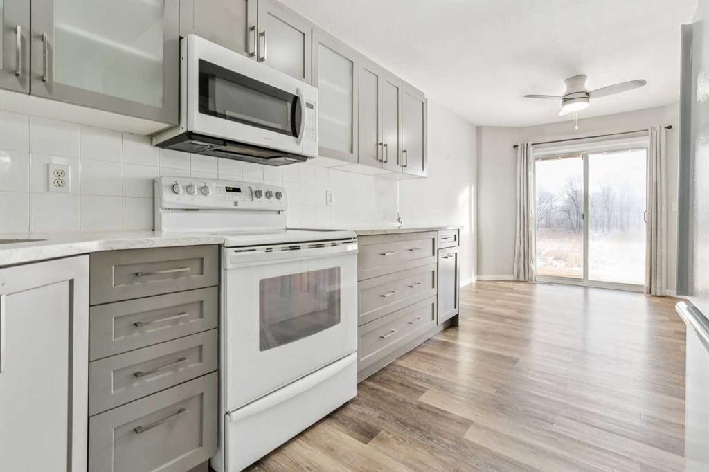 1005 Eagleview Place Nw, High River, AB - Indoor Photo Showing Kitchen
