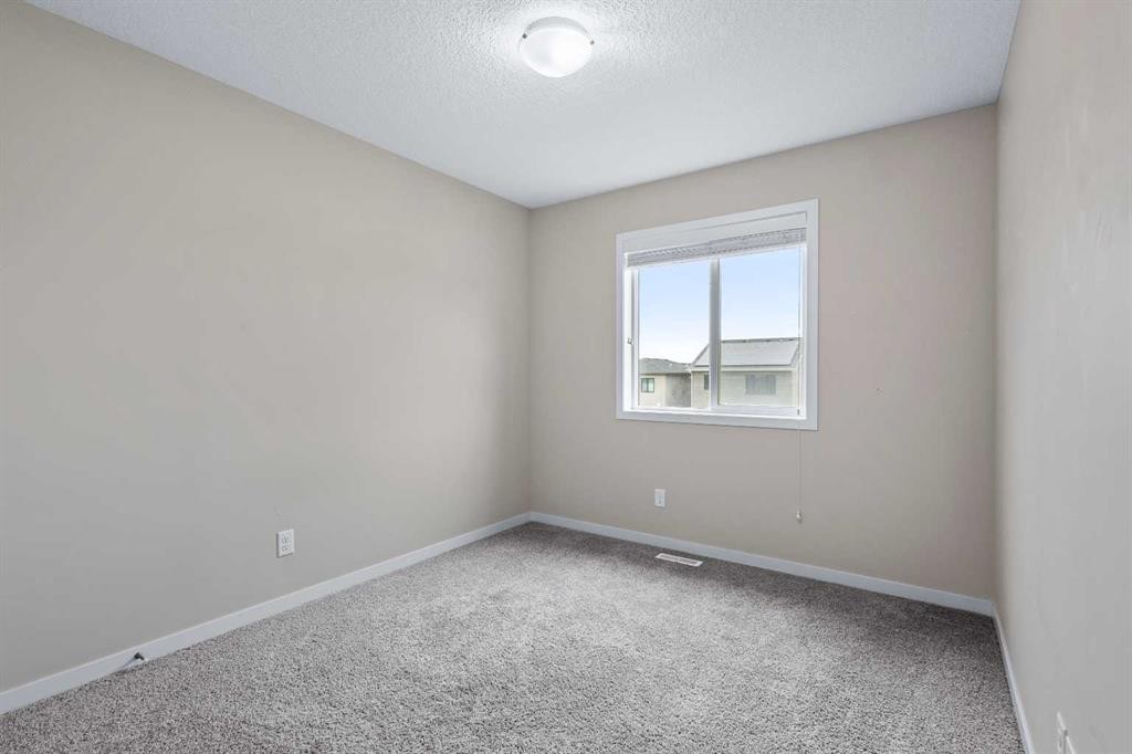 44 Howse Drive Ne, Calgary, AB - Indoor Photo Showing Other Room