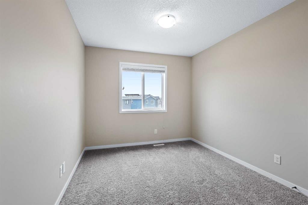 44 Howse Drive Ne, Calgary, AB - Indoor Photo Showing Other Room