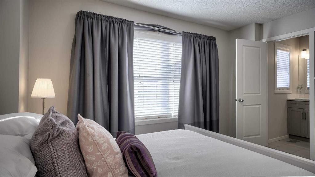 393 Walden Parade Se, Calgary, AB - Indoor Photo Showing Bedroom