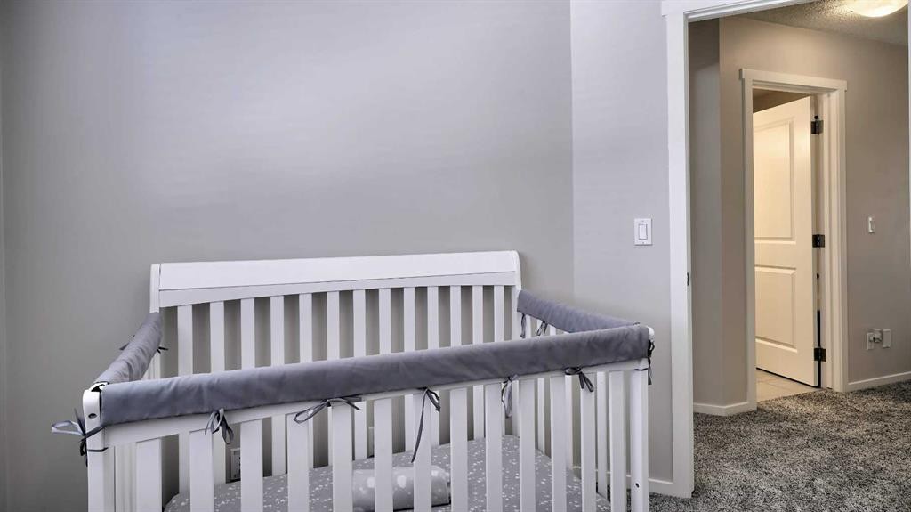 393 Walden Parade Se, Calgary, AB - Indoor Photo Showing Bedroom