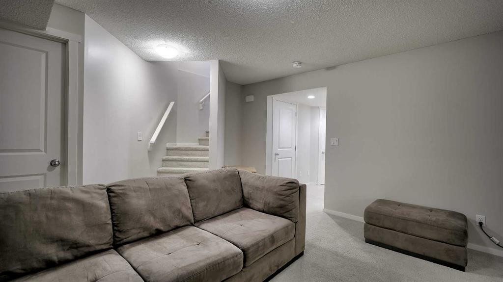 393 Walden Parade Se, Calgary, AB - Indoor Photo Showing Living Room