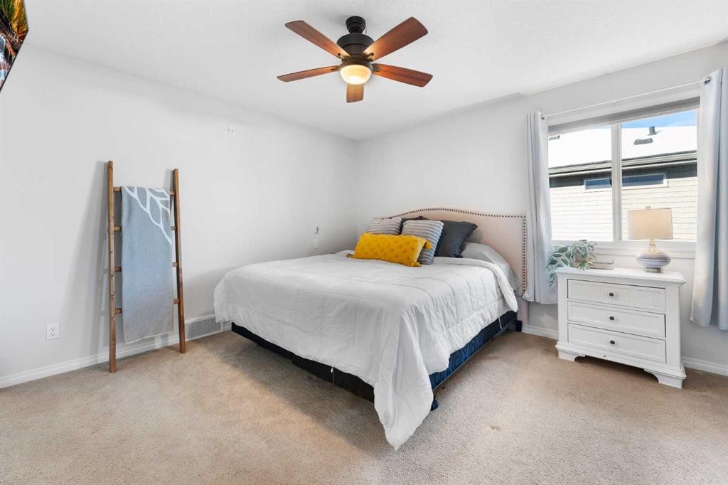 128 Auburn Bay Avenue Se, Calgary, AB - Indoor Photo Showing Bedroom