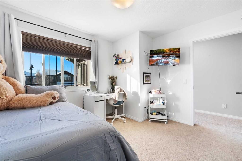 128 Auburn Bay Avenue Se, Calgary, AB - Indoor Photo Showing Bedroom