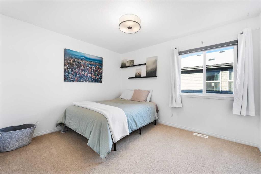 128 Auburn Bay Avenue Se, Calgary, AB - Indoor Photo Showing Bedroom