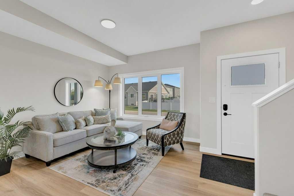 13 Gray Close, Sylvan Lake, AB - Indoor Photo Showing Living Room