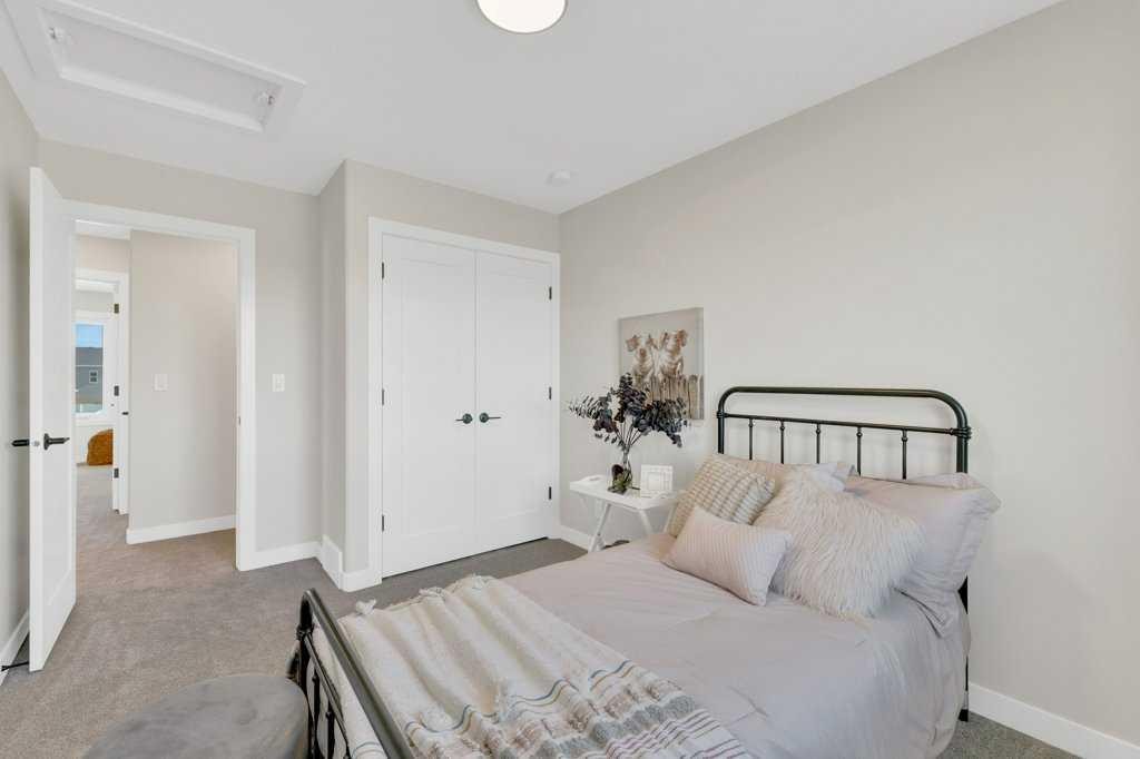 13 Gray Close, Sylvan Lake, AB - Indoor Photo Showing Bedroom