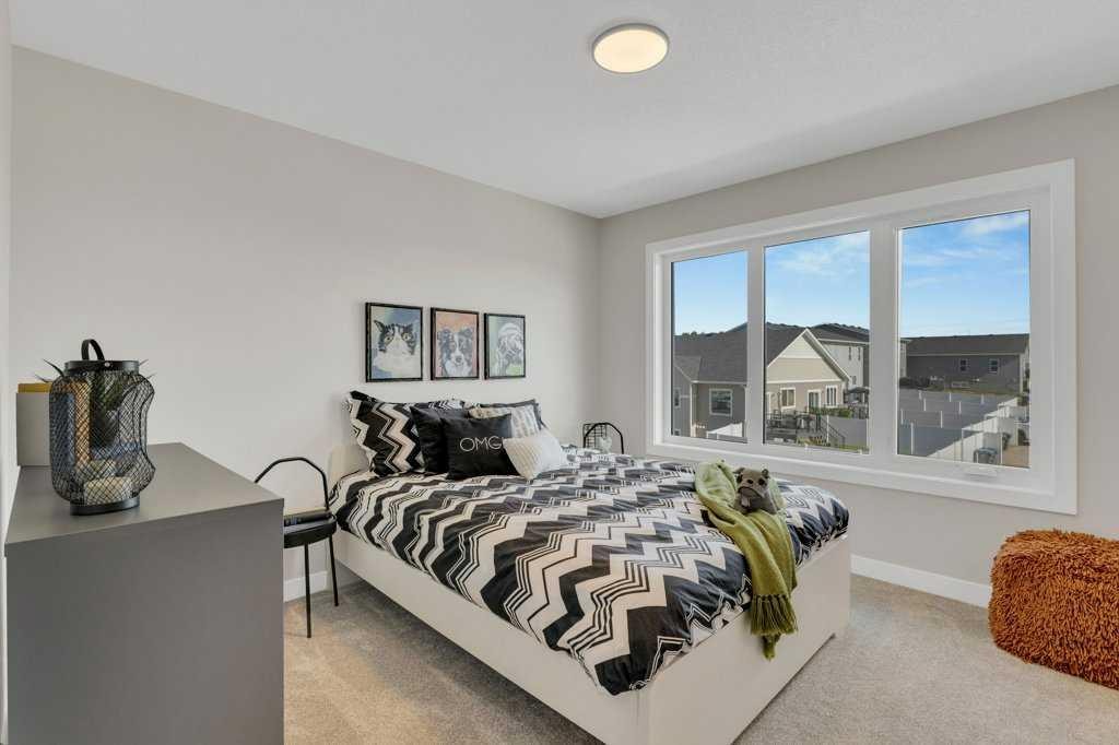 13 Gray Close, Sylvan Lake, AB - Indoor Photo Showing Bedroom