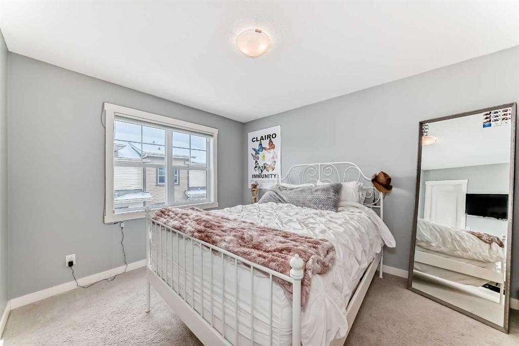 105 Mckenzie Towne Square Se, Calgary, AB - Indoor Photo Showing Bedroom