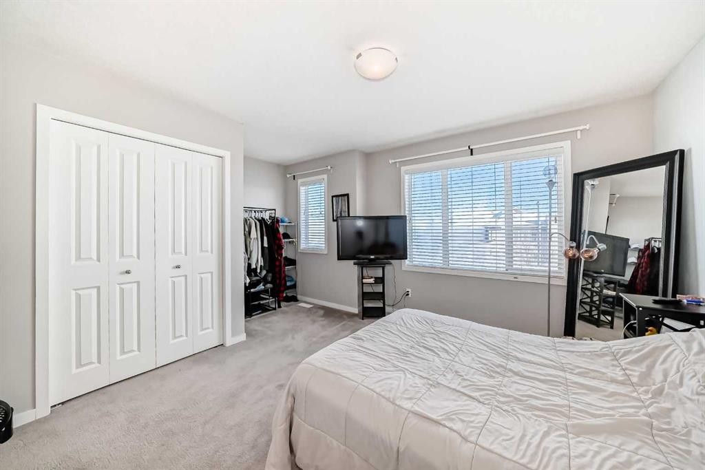 656 Copperpond Boulevard Se, Calgary, AB - Indoor Photo Showing Bedroom